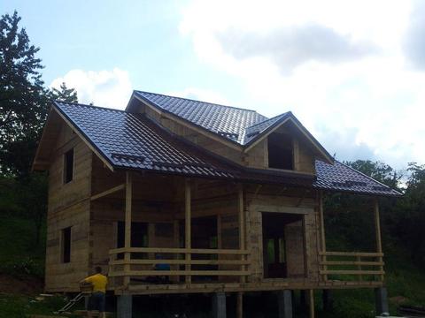 Vand cabana - casa din lemn cu teren intravilan 18 arii / Moldovenesti