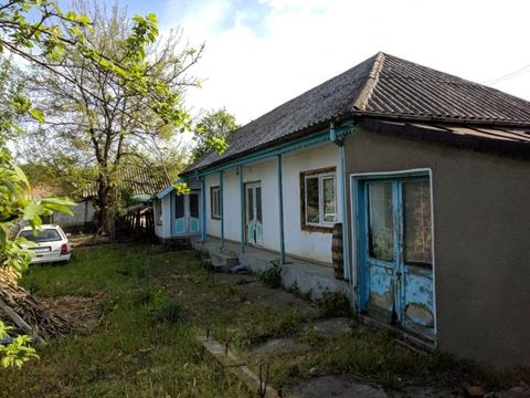 Teren de vanzare + casă