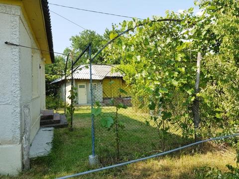 Casa 99 m2 cu teren 6500 m2 in satul Baimac, com. Izvorul Berheciului