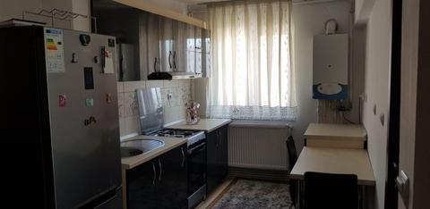 Apartament cu doua camere , partial mobilat