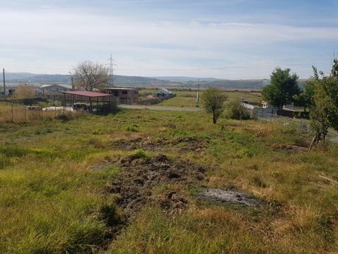 Pamant de umplutura pe teren intravilan la strada in