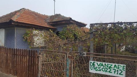 Casa veche și pământ