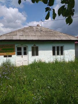 Casă de vinzare + două hectare de pădure