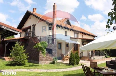 Casa noua frumoasa plus anexe si teren mare langa Bucuresti