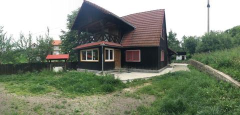 Casa de lemn in zona linistita