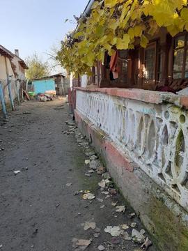 Vand casa din cărămidă la 6 km de Dragasani VL curte + vie
